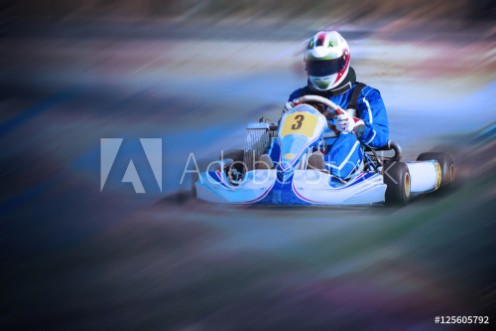Picture of Karting - driver in helmet on kart circuit
